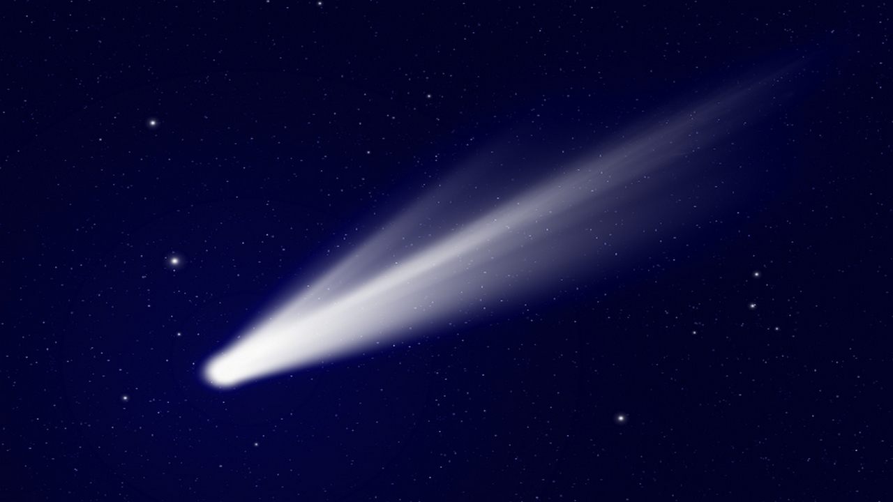 cometa stelle cielo blu